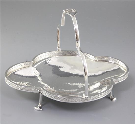 A George V Arts & Crafts silver shallow basket, by Albert Edward Jones, width 277mm, weight 13oz/405grms.